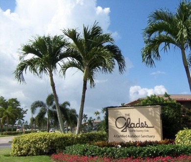 Desirable First Floor condo with a beautiful view of the 18th on The Glades Golf and Country Club in Florida - for sale on GolfHomes.com, golf home, golf lot