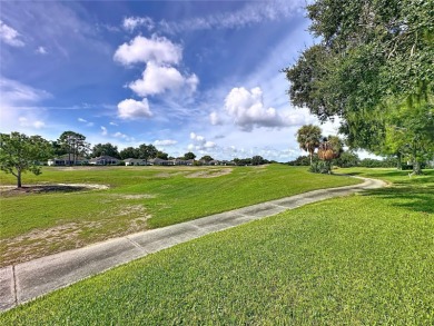 Fabulous St Regis model with  2.5 car garage located on The on Kings Ridge Golf Club in Florida - for sale on GolfHomes.com, golf home, golf lot