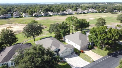 Fabulous St Regis model with  2.5 car garage located on The on Kings Ridge Golf Club in Florida - for sale on GolfHomes.com, golf home, golf lot