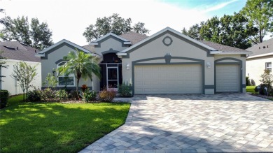 Fabulous St Regis model with  2.5 car garage located on The on Kings Ridge Golf Club in Florida - for sale on GolfHomes.com, golf home, golf lot