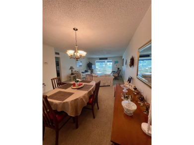 Experience the tranquility of waterfront living in this charming on Gulf Harbors Golf Course in Florida - for sale on GolfHomes.com, golf home, golf lot