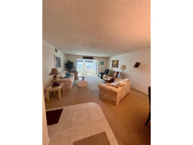 Experience the tranquility of waterfront living in this charming on Gulf Harbors Golf Course in Florida - for sale on GolfHomes.com, golf home, golf lot