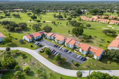 Enjoy peaceful views of the 14th fairway at Miles Grant Golf on Miles Grant Country Club in Florida - for sale on GolfHomes.com, golf home, golf lot