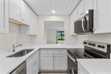 Enjoy peaceful views of the 14th fairway at Miles Grant Golf on Miles Grant Country Club in Florida - for sale on GolfHomes.com, golf home, golf lot