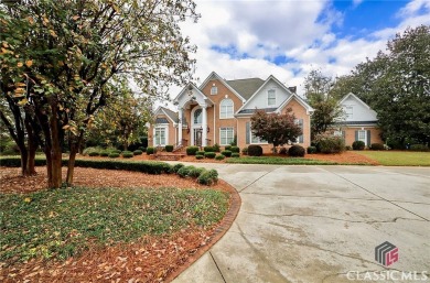 Classic elegance and Southern tradition are the hallmarks of on Jennings Mill Country Club in Georgia - for sale on GolfHomes.com, golf home, golf lot