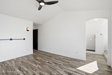 Freshly updated and move-in ready! This expansive 4,120 SF home on Trailhead At Liberty Lake in Washington - for sale on GolfHomes.com, golf home, golf lot