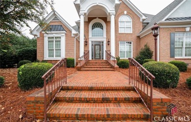 Classic elegance and Southern tradition are the hallmarks of on Jennings Mill Country Club in Georgia - for sale on GolfHomes.com, golf home, golf lot