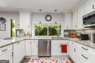 Welcome to this beautiful mid-century ranch-style house located on Rivermont Golf and Country Club in Georgia - for sale on GolfHomes.com, golf home, golf lot