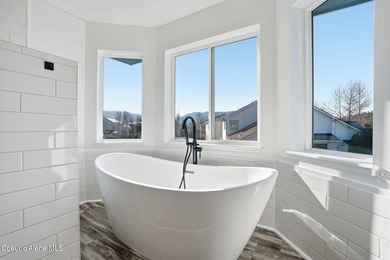 Freshly updated and move-in ready! This expansive 4,120 SF home on Trailhead At Liberty Lake in Washington - for sale on GolfHomes.com, golf home, golf lot