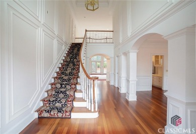 Classic elegance and Southern tradition are the hallmarks of on Jennings Mill Country Club in Georgia - for sale on GolfHomes.com, golf home, golf lot