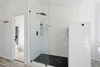 Freshly updated and move-in ready! This expansive 4,120 SF home on Trailhead At Liberty Lake in Washington - for sale on GolfHomes.com, golf home, golf lot