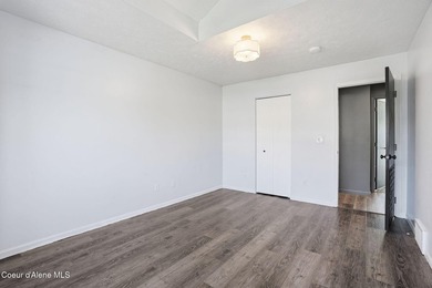 Freshly updated and move-in ready! This expansive 4,120 SF home on Trailhead At Liberty Lake in Washington - for sale on GolfHomes.com, golf home, golf lot