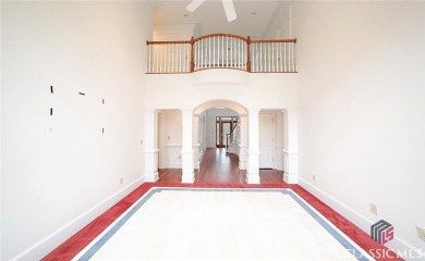 Classic elegance and Southern tradition are the hallmarks of on Jennings Mill Country Club in Georgia - for sale on GolfHomes.com, golf home, golf lot