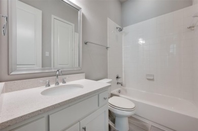 Welcome to this STUNING 4-bedroom, 4.5-bath home nestled in the on The Tribute At the Colony in Texas - for sale on GolfHomes.com, golf home, golf lot