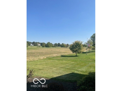 This lovely home enjoys a panoramic view of the Plum Creek Golf on Plum Creek Golf Club in Indiana - for sale on GolfHomes.com, golf home, golf lot