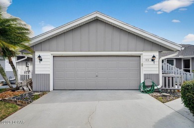 Tucked inside one of New Smyrna Beach's most peaceful golf-side on Hidden Lakes Golf Club in Florida - for sale on GolfHomes.com, golf home, golf lot