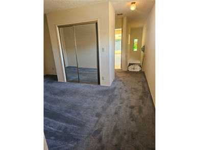 A double-lot home, priced for a quick sale, asking only $349,000 on Chaparral Golf and Country Club in Arizona - for sale on GolfHomes.com, golf home, golf lot