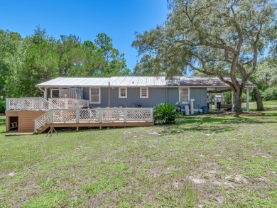 Can you imagine sitting on your rocking chair front porch on St. James Bay in Florida - for sale on GolfHomes.com, golf home, golf lot
