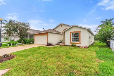 Very nice pool home that is waterfront located in in Ridgewood on Ridgewood Lakes Golf and Country Club in Florida - for sale on GolfHomes.com, golf home, golf lot