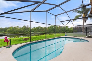 Very nice pool home that is waterfront located in in Ridgewood on Ridgewood Lakes Golf and Country Club in Florida - for sale on GolfHomes.com, golf home, golf lot