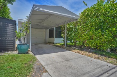 Beautifully updated turn-key home in desirable Hollywood Lakes on Hollywood Beach Golf and Country Club in Florida - for sale on GolfHomes.com, golf home, golf lot