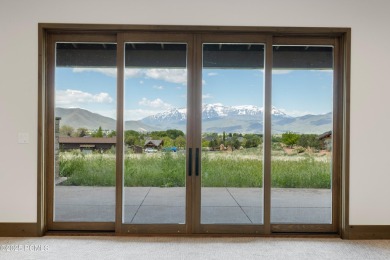 Experience unparalleled mountain luxury and convenience with on Red Ledges Golf Club in Utah - for sale on GolfHomes.com, golf home, golf lot