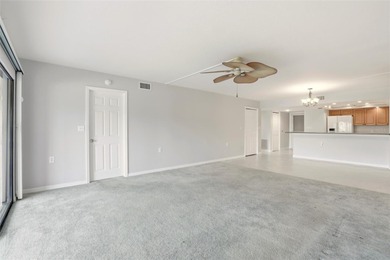 Prime Waterfront Condo in Banyan Point - Punta Gorda Isles on Saint Andrews South Golf Club in Florida - for sale on GolfHomes.com, golf home, golf lot