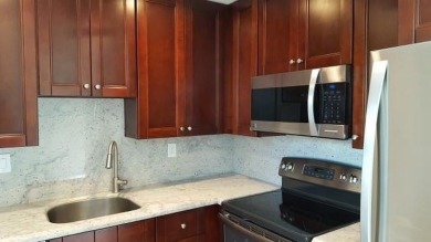 55+ community. Welcome to this appealing second-floor residence on Kings Point Golf -Flanders Way in Florida - for sale on GolfHomes.com, golf home, golf lot