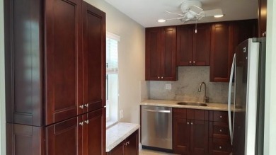 55+ community. Welcome to this appealing second-floor residence on Kings Point Golf -Flanders Way in Florida - for sale on GolfHomes.com, golf home, golf lot