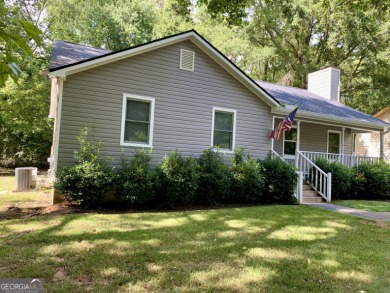 Discover this beautifully updated home nestled in a desirable on Golf Club of Macon in Georgia - for sale on GolfHomes.com, golf home, golf lot