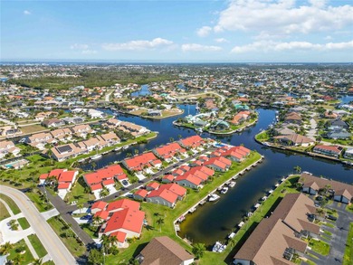 Discover relaxed WATERFRONT living in this beautifully updated on Saint Andrews South Golf Club in Florida - for sale on GolfHomes.com, golf home, golf lot