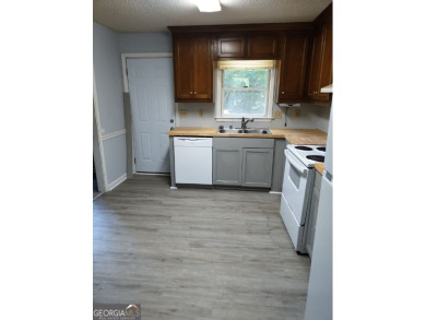 Discover this beautifully updated home nestled in a desirable on Golf Club of Macon in Georgia - for sale on GolfHomes.com, golf home, golf lot