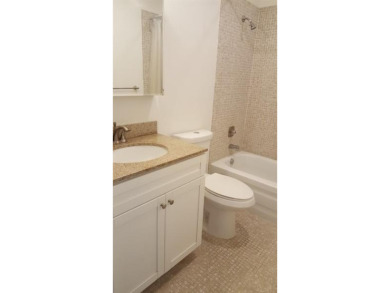 55+ community. Welcome to this appealing second-floor residence on Kings Point Golf -Flanders Way in Florida - for sale on GolfHomes.com, golf home, golf lot