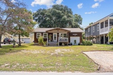 Welcome to 132 NE 3rd St, Oak Island, where laid-back beach on Founders Club At St. James Plantation in North Carolina - for sale on GolfHomes.com, golf home, golf lot