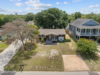 BIG PRICE IMPROVEMENT! Welcome to 132 NE 3rd St, Oak Island on Founders Club At St. James Plantation in North Carolina - for sale on GolfHomes.com, golf home, golf lot
