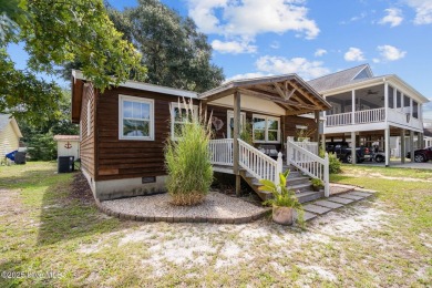 Welcome to 132 NE 3rd St, Oak Island, where laid-back beach on Founders Club At St. James Plantation in North Carolina - for sale on GolfHomes.com, golf home, golf lot