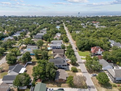 Welcome to 132 NE 3rd St, Oak Island, where laid-back beach on Founders Club At St. James Plantation in North Carolina - for sale on GolfHomes.com, golf home, golf lot