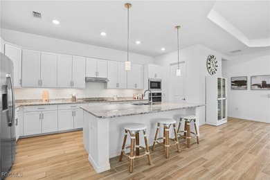 Wake up every day feeling like you're on vacation in this on Heritage Landing Golf  in Florida - for sale on GolfHomes.com, golf home, golf lot