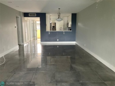 TOTALLY RENOVATED AND FULLY UPGRADED WITH SHAKER CABINETS on Inverrary Country Club in Florida - for sale on GolfHomes.com, golf home, golf lot