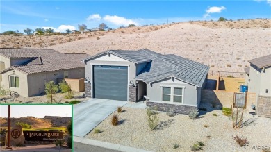 Looking for that PRACTICALLY NEW home with RV GARAGE? Take a on Laughlin Ranch Golf Club in Arizona - for sale on GolfHomes.com, golf home, golf lot