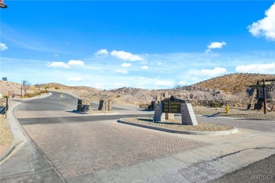 Looking for that PRACTICALLY NEW home with RV GARAGE? Take a on Laughlin Ranch Golf Club in Arizona - for sale on GolfHomes.com, golf home, golf lot