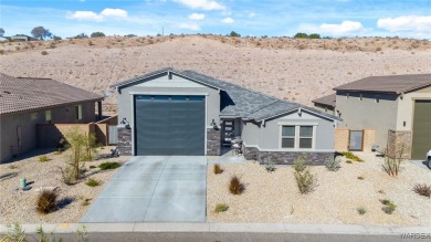 Looking for that PRACTICALLY NEW home with RV GARAGE? Take a on Laughlin Ranch Golf Club in Arizona - for sale on GolfHomes.com, golf home, golf lot