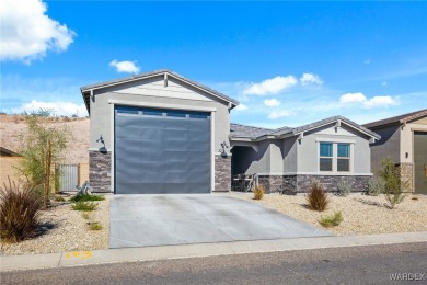 Looking for that PRACTICALLY NEW home with RV GARAGE? Take a on Laughlin Ranch Golf Club in Arizona - for sale on GolfHomes.com, golf home, golf lot