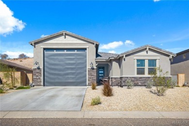 Looking for that PRACTICALLY NEW home with RV GARAGE? Take a on Laughlin Ranch Golf Club in Arizona - for sale on GolfHomes.com, golf home, golf lot