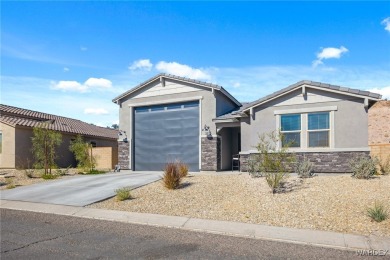 Looking for that PRACTICALLY NEW home with RV GARAGE? Take a on Laughlin Ranch Golf Club in Arizona - for sale on GolfHomes.com, golf home, golf lot