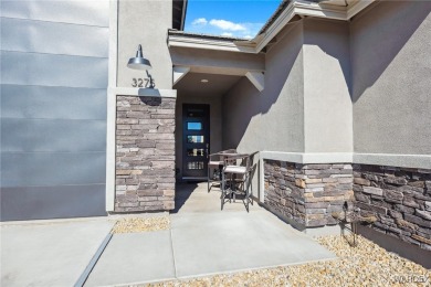 Looking for that PRACTICALLY NEW home with RV GARAGE? Take a on Laughlin Ranch Golf Club in Arizona - for sale on GolfHomes.com, golf home, golf lot