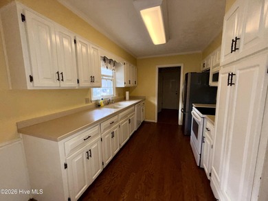 Welcome to this well-located, 4 bedroom 2.5 bath home nestled in on Scotch Meadows Country Club in North Carolina - for sale on GolfHomes.com, golf home, golf lot