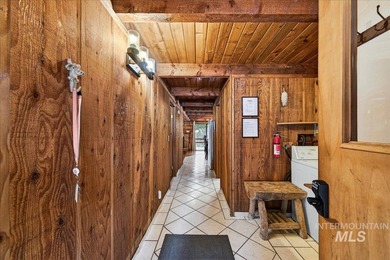 Beautiful 1,244 sq. ft. log home offering 2 bed/1 bath, with on Terrace Lakes Golf Resort in ID - for sale on GolfHomes.com, golf home, golf lot