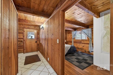 Beautiful 1,244 sq. ft. log home offering 2 bed/1 bath, with on Terrace Lakes Golf Resort in ID - for sale on GolfHomes.com, golf home, golf lot