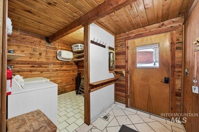 Beautiful 1,244 sq. ft. log home offering 2 bed/1 bath, with on Terrace Lakes Golf Resort in ID - for sale on GolfHomes.com, golf home, golf lot